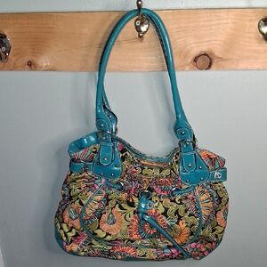 LineaR Colorful Floral Shoulder Bag with Tea Leatherl Highlights.